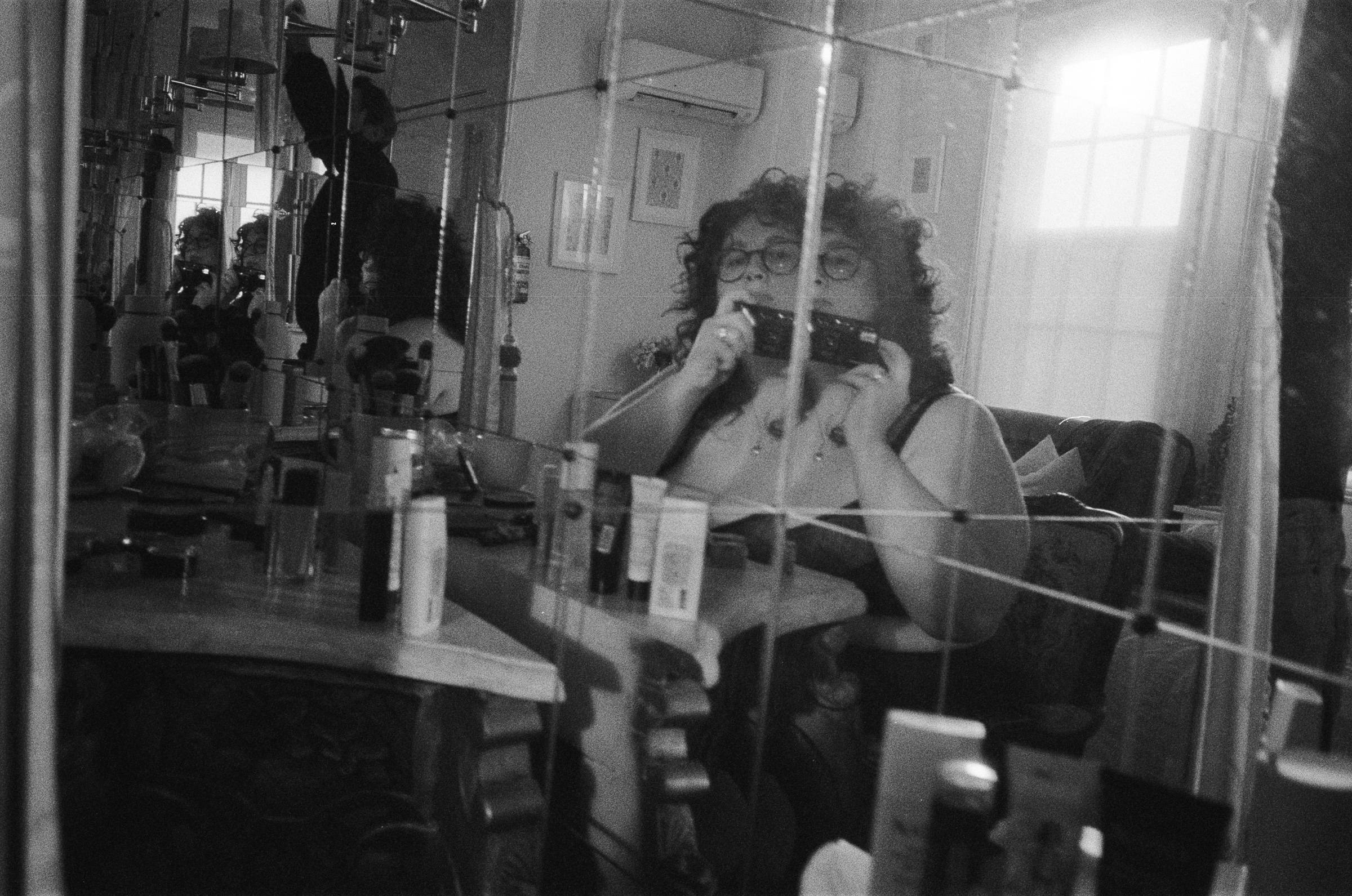 Self-portrait of Georgia Lilley, wedding and family photographer in Launceston, on black and white film